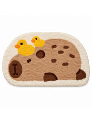 Resting Capybara & Ducklings Shaped Bath Mat on a white background