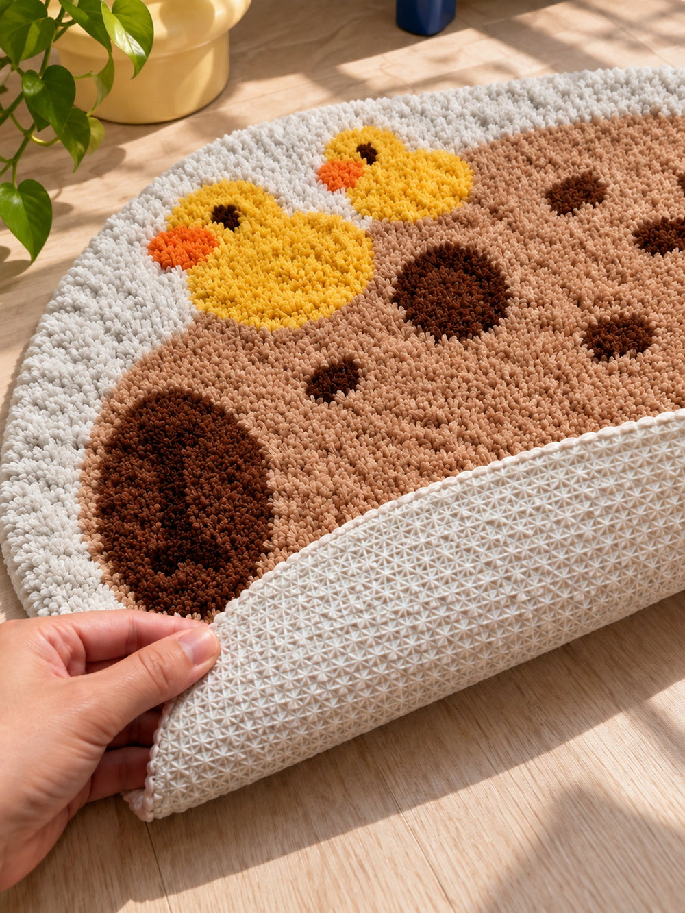 Resting Capybara & Ducklings Shaped Bath Mat — backing detail