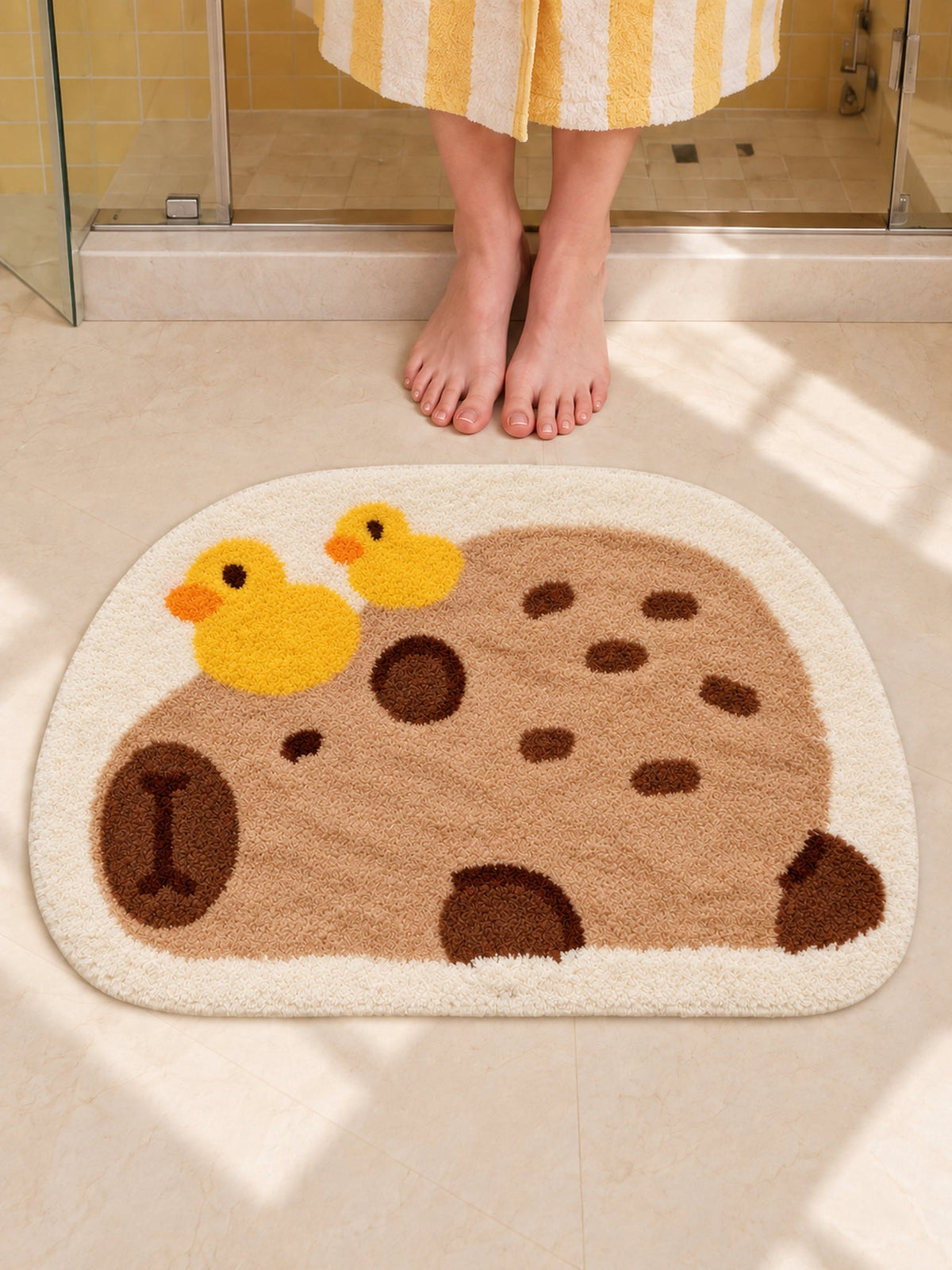 Resting Capybara & Ducklings Shaped Bath Mat — bathroom closeup