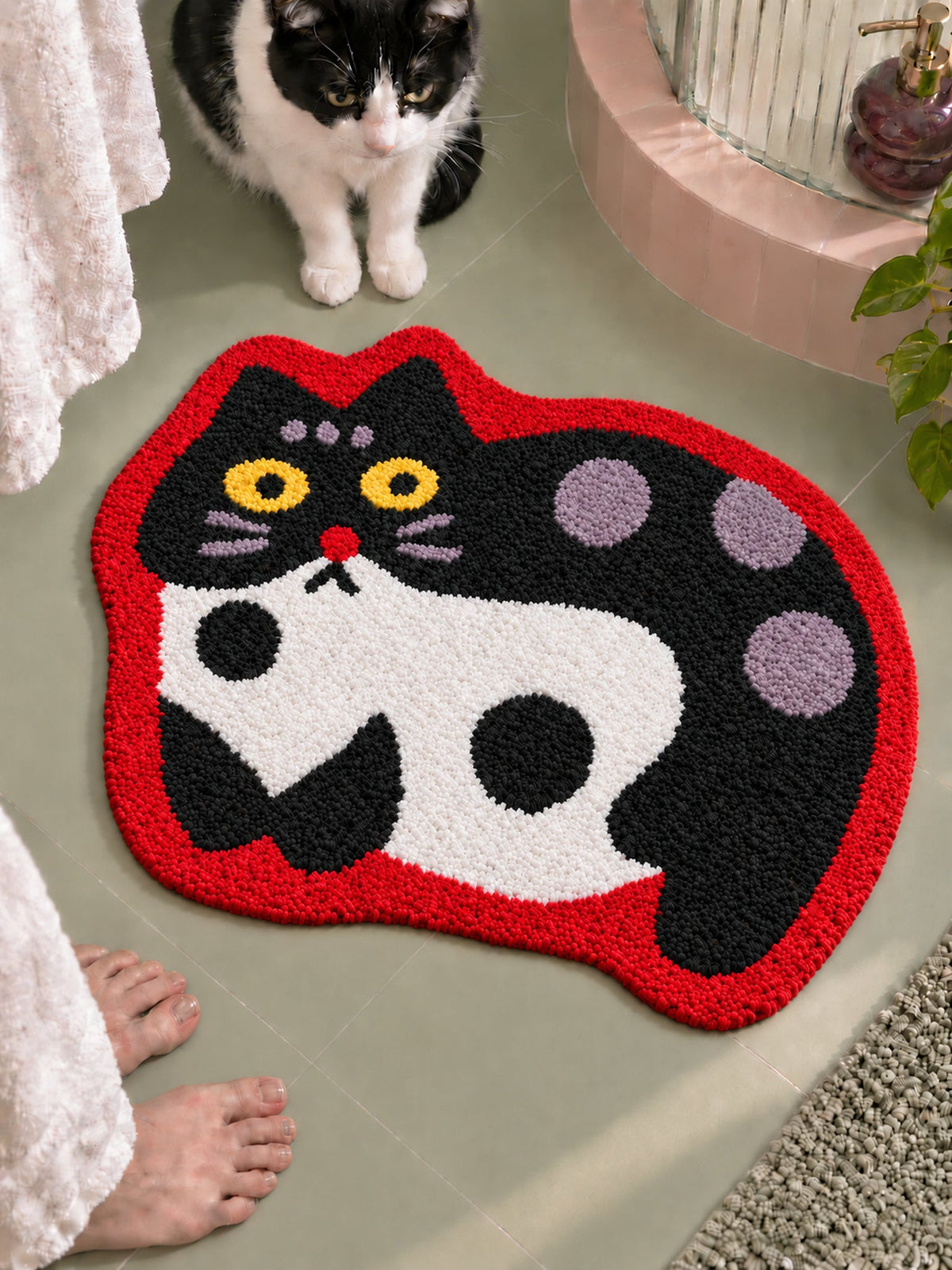 Spotted Cat Red-Outline Bath Mat — bathroom context detail