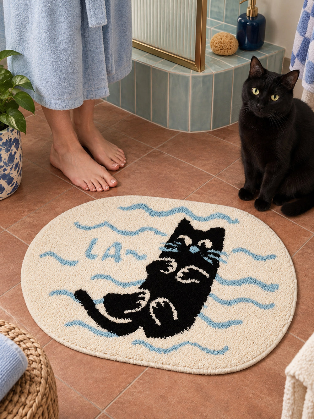 Poolside Black Cat Oval Bath Mat — bathroom scene