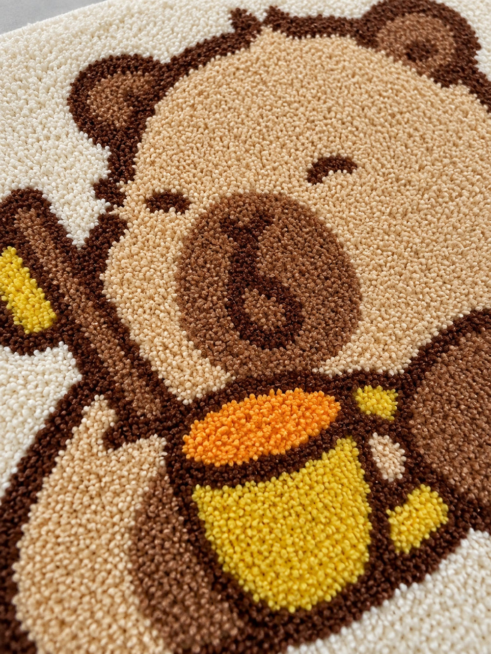 Capybara Morning Brush Shaped Bath Mat — surface detail