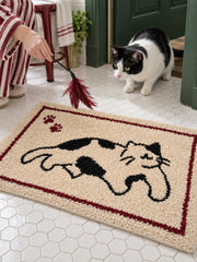 Playful Spotted Cat Framed Bath Mat — bathroom context detail