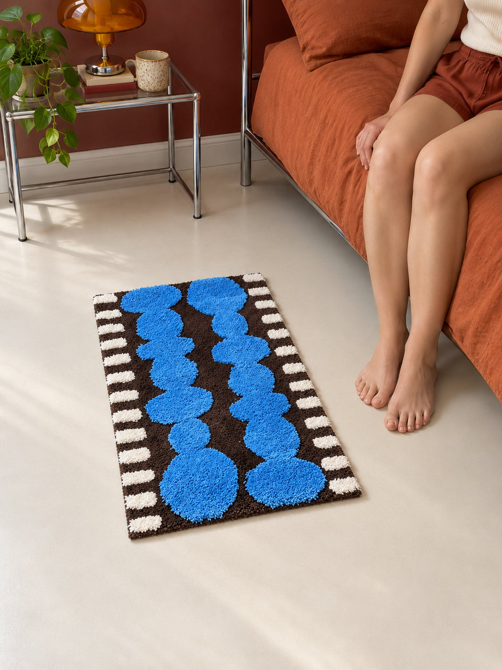 Electric Blue Pebbles Retro Bath Mat — bedroom scene