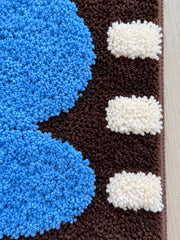Electric Blue Pebbles Retro Bath Mat — surface detail