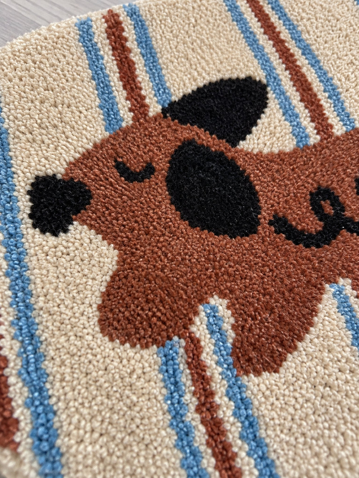Curly Pup Blue Stripe Bath Mat — surface detail