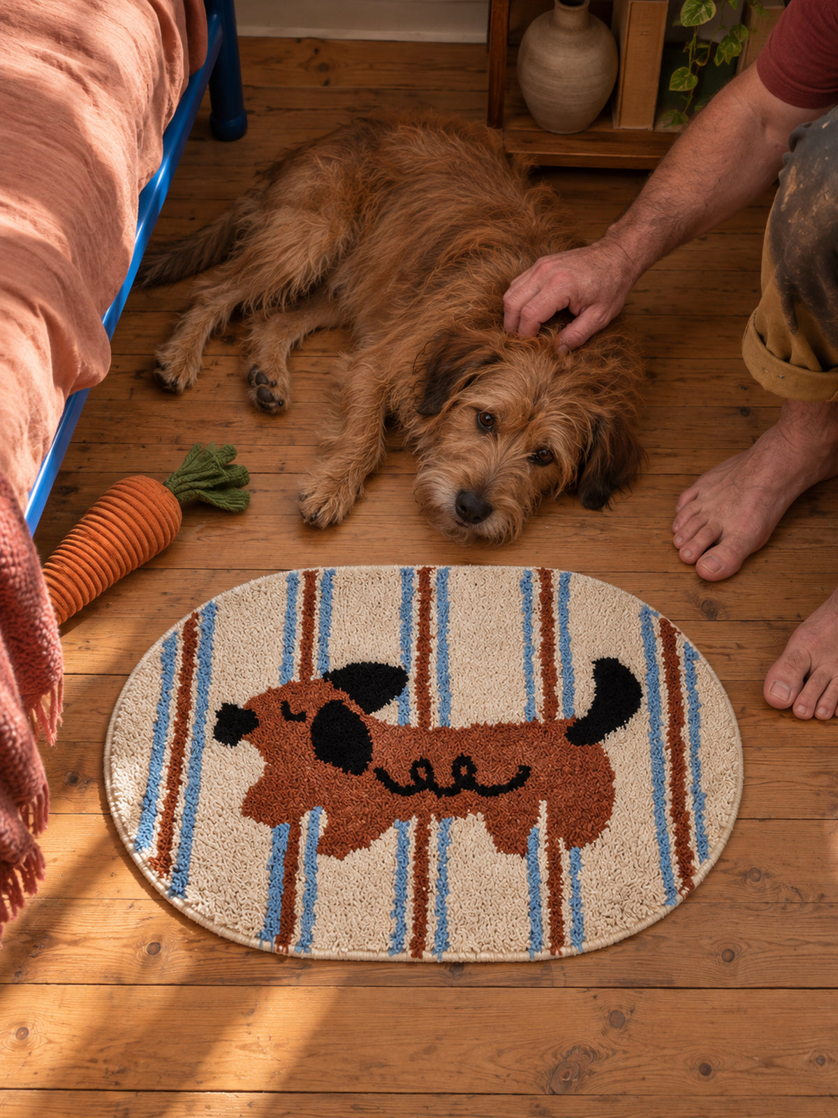 Curly Pup Blue Stripe Bath Mat — bedside context detail