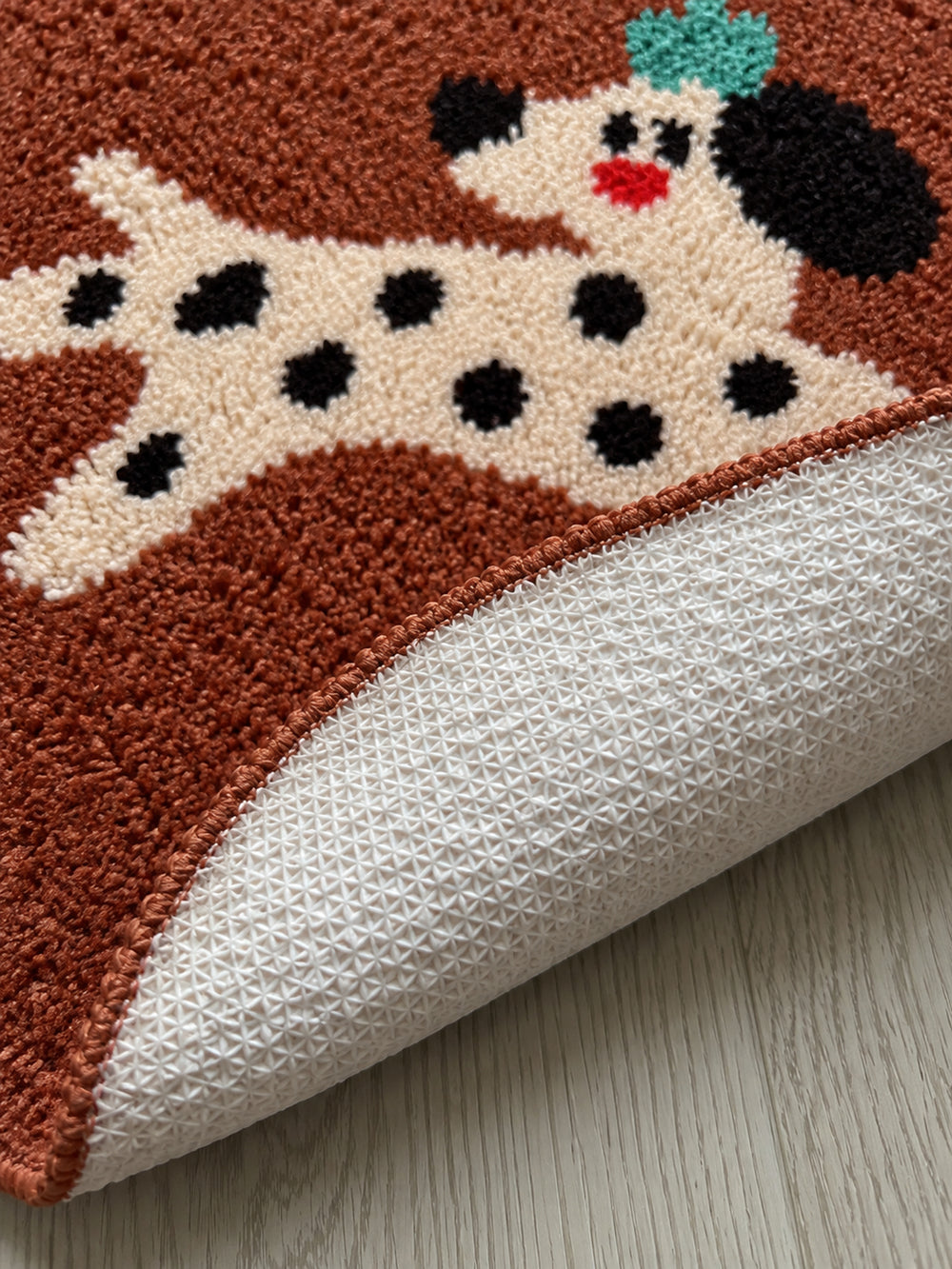 Dashing Dalmatian Oval Bath Mat — backing detail