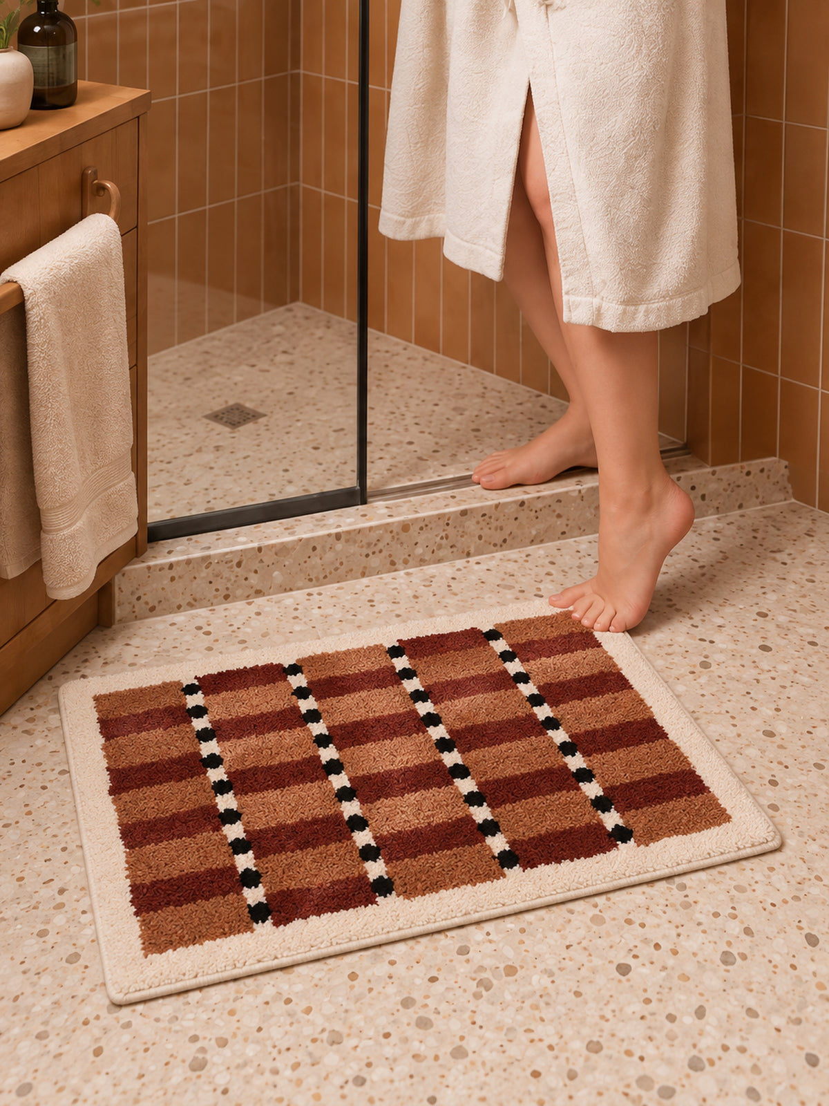 Sage Cocoa Grid Geometric Bath Mat — bathroom scene