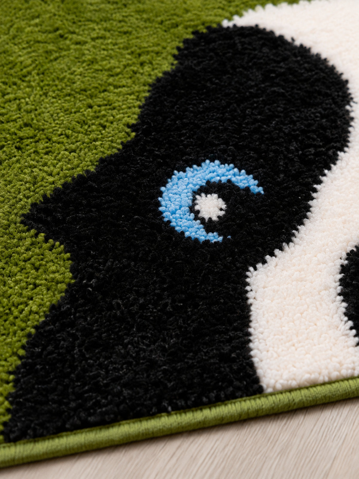 Peekaboo Puppy Green Bath Mat — surface detail