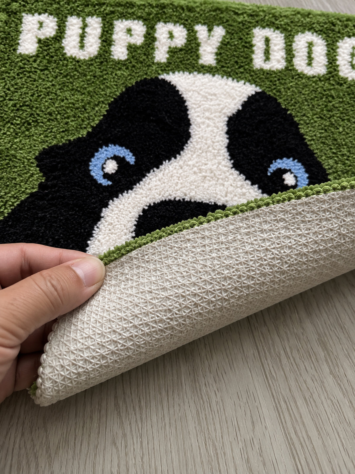 Peekaboo Puppy Green Bath Mat — backing detail