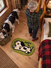 Stretching Spotted Puppy Bath Mat - Green — bedroom scene
