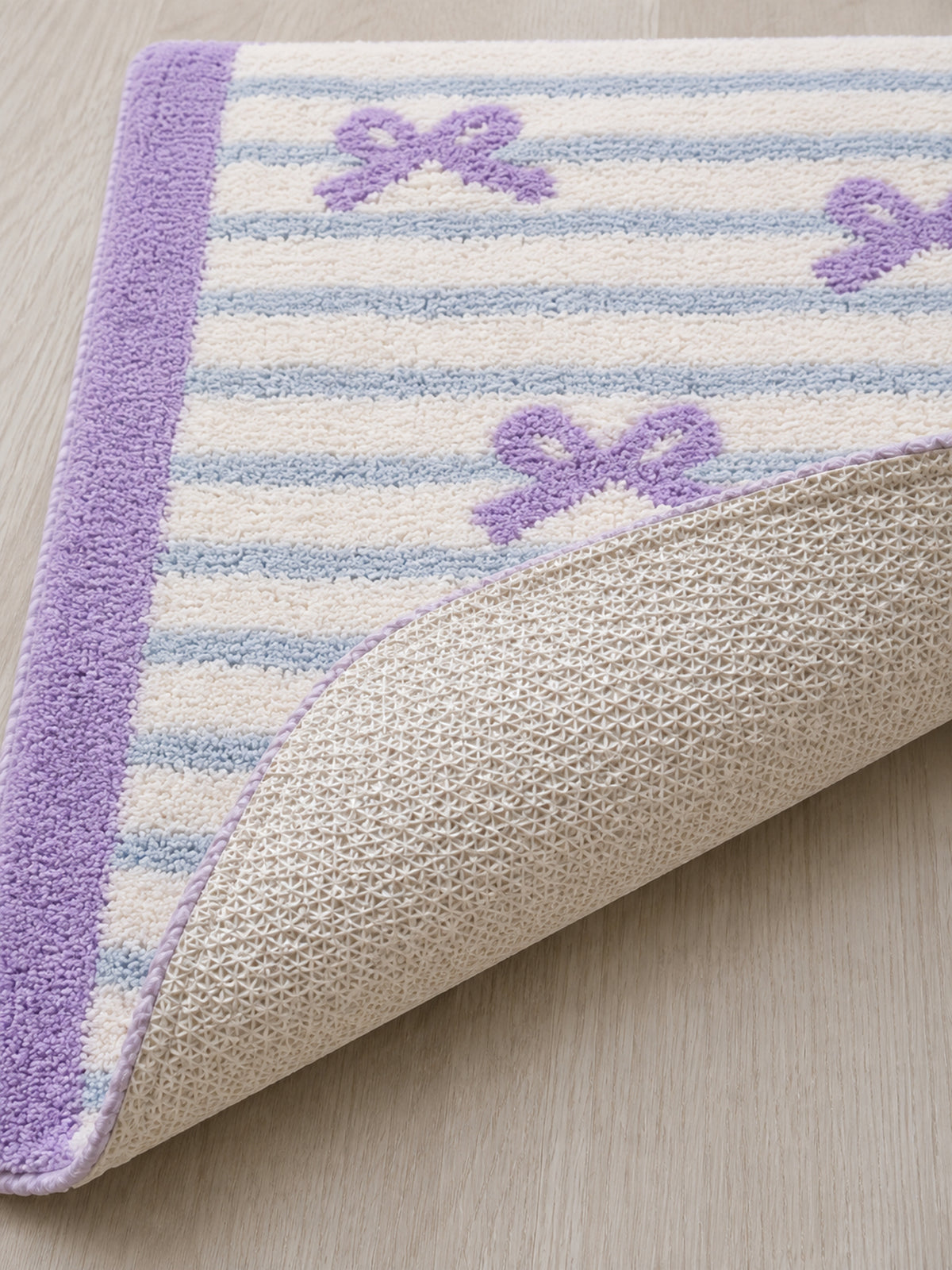 Ribbon Stripe Bow Bath Mat - Lavender — backing detail