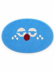Sleepy Blue Face Oval Bath Mat on a white background